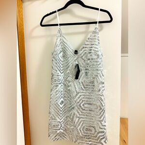 Sequined free with thin adjustable straps in silver and white